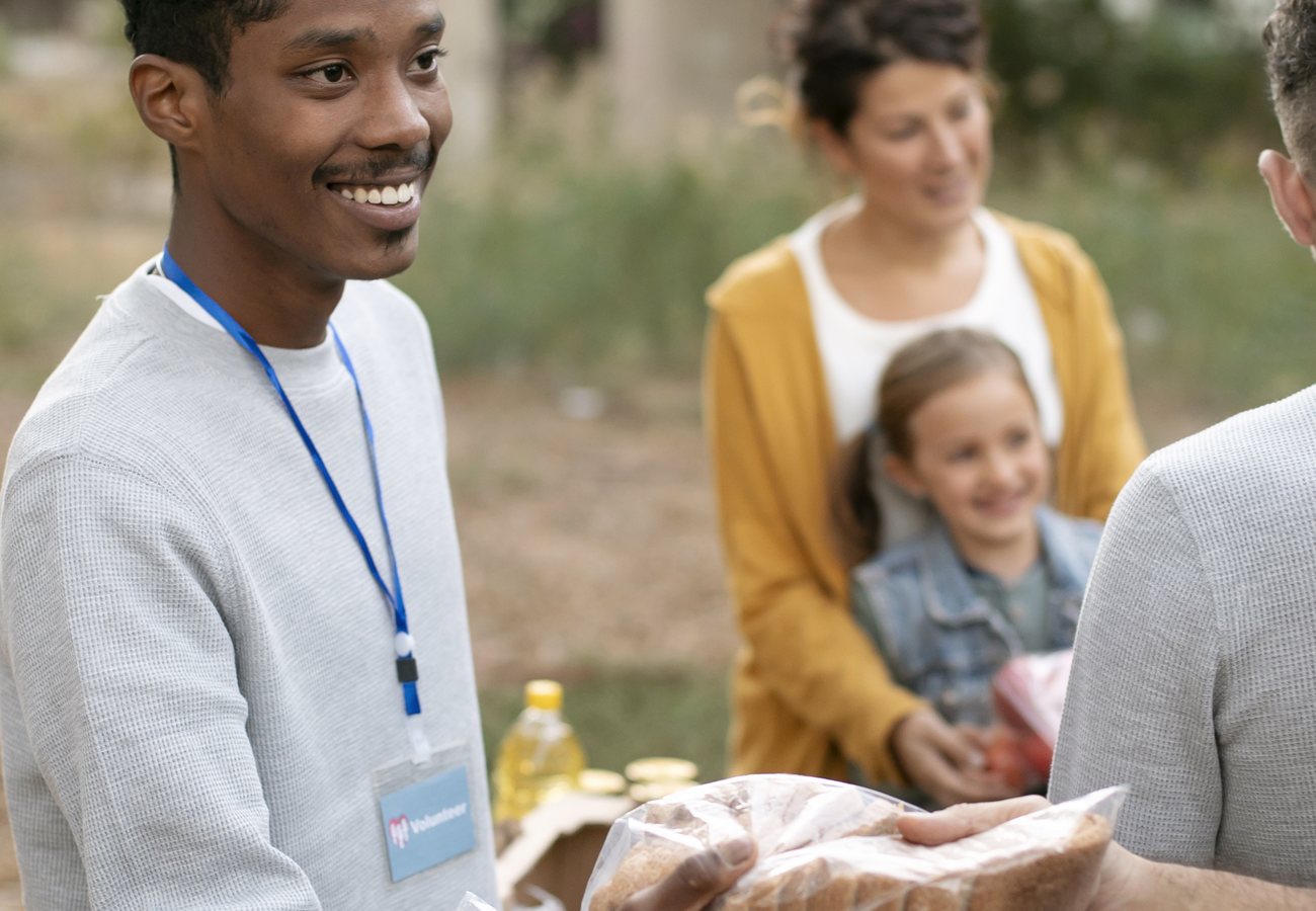 A volunteer sorting donated clothing